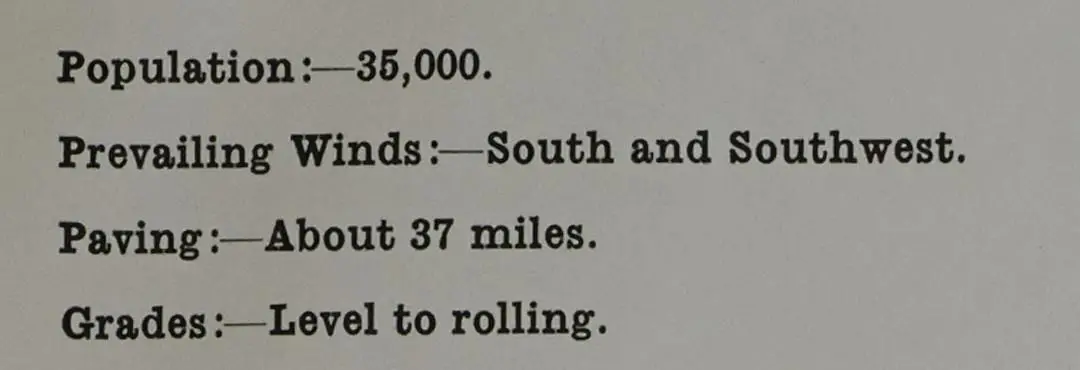 Printed report page, 1938: “Population:—35,000. Prevailing Winds:—South and Southwest. Paving:—About 37 miles. Grades:—Level to rolling.”